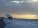 SX33354 Waves at Porthcawl lighthouse.jpg